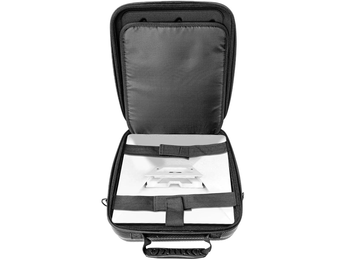 Overhead view of an open Starlink Mini hard travel case showing the white satellite dish securely nested in the custom-moulded base with black security straps and a padded lid.